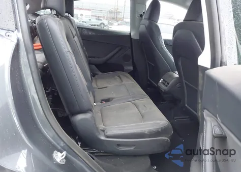 2023 Tesla Model Y из США, поврежденный, VIN 7SAYGAEEXPF685356